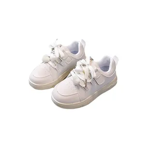 White fashion sports sneakers for girls with heart-shaped lace charms