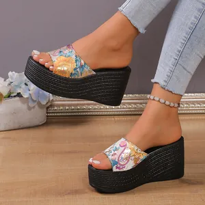 Detailed view of floral pattern wedge slippers for women with platform sole