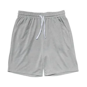 Flat lay view of men's casual grey sports shorts with adjustable drawstring waist