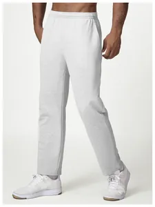 Side view of men's loose light grey sports sweatpants with elastic waist