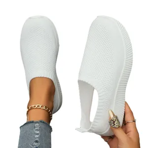 Breathable white knit sneakers for women featuring a slip-on design and lightweight mesh upper