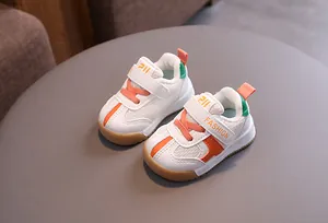 Toddler breathable white mesh walking shoes with orange accents and velcro strap