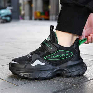 Breathable black and green mesh sneakers for big kids, stylish and comfortable dad shoe design