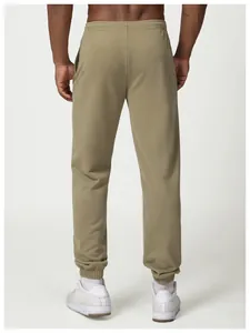 Detailed rear view of men's olive green drawstring joggers with elastic ankle cuffs