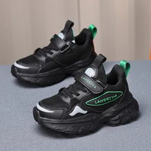 Children's breathable mesh sports shoes in black and green, classic daddy shoe style