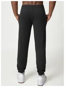 Rear view detail of black men's athletic joggers featuring cuffed ankles and a comfortable fit