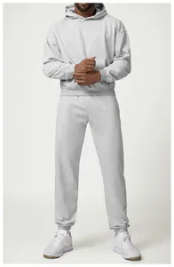 Close-up detail of grey men's joggers showing high-quality fabric and athletic fit