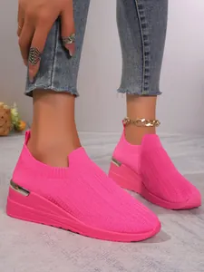 Vibrant pink fly-knit wedge sneakers for women, casual sports mesh slip-on shoes