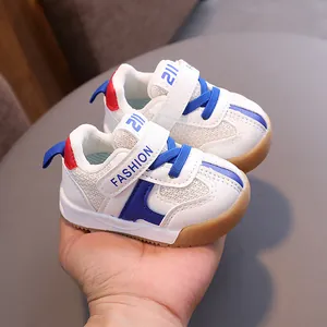 White and blue breathable mesh toddler walking shoes with adjustable velcro strap