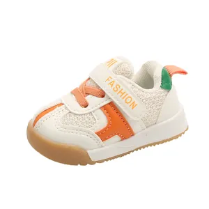 Breathable mesh toddler walking shoes with orange accents and adjustable strap