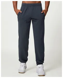 Front view of men's navy blue joggers featuring elastic waist and ribbed cuffs
