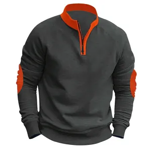 Gedetailleerd overzicht van grijze herensweatshirt met oranje rits en elleboogstukken