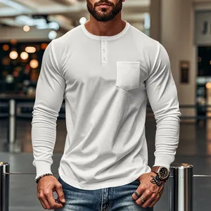 Close-up of men's white long sleeve Henley T-shirt featuring a front pocket and buttons