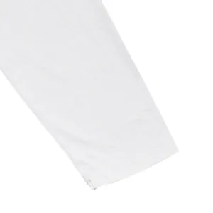 Close-up detail of breathable white cotton fabric and stitching on men's T-shirt