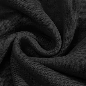 Macro view showing the high-quality soft black knitted fabric texture of men's winter hoodie