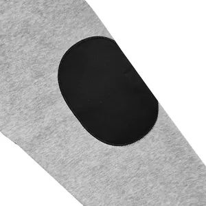 Close-up detail of grey sweatshirt sleeve featuring a durable black elbow patch