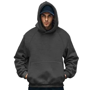 Close-up detail of men's charcoal grey oversized fleece hoodie with kangaroo pocket