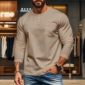 Close-up view of men's khaki long-sleeved Henley shirt with chest pocket detail on model