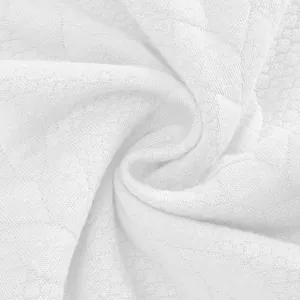 Macro view of soft white heavy jacquard cotton fabric for vintage men's sweatshirt