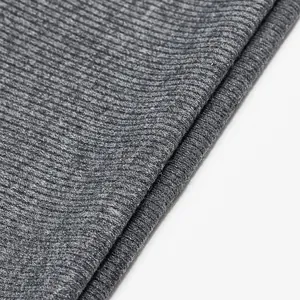 Close-up macro view of the grey ribbed knit fabric texture for men's autumn winter hoodie
