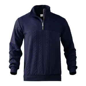 Detail view of navy blue quarter-zip sweatshirt with textured cable knit patterns