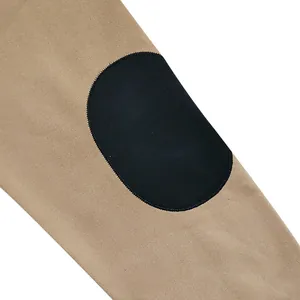 Close-up detail of black oval elbow patch on tan heavyweight cotton fleece sweatshirt
