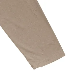 Close-up of double-stitched sleeve cuff on breathable men's long sleeve T-shirt