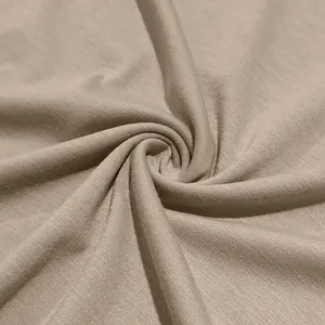 Close-up detail of the breathable and soft fabric texture of the men's slim fit T-shirt.
