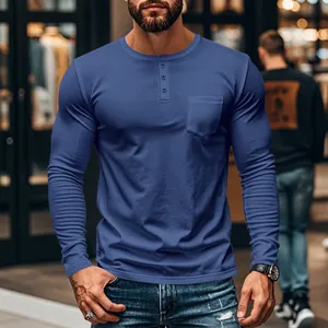 Detail shot of men's blue long-sleeved slim fit Henley T-shirt with functional chest pocket.