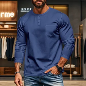 Detail view of men's blue long-sleeved Henley t-shirt with button placket and pocket
