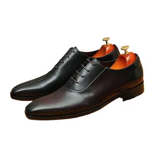 Elegantes zapatos Oxford de cuero genuino para hombre estilo británico marrón oscuro