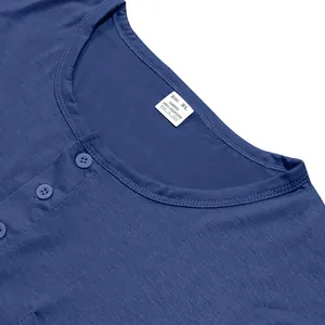 Close-up of the blue men's Henley T-shirt neckline showing the size and material tag.