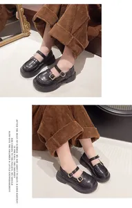Classic girls' British style black Mary Jane leather shoes with double gold buckles detail