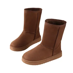 Classic brown high-top suede snow boots for women with warm faux fur lining winter wear