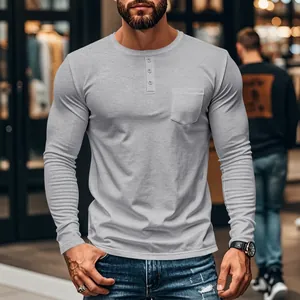 Men's slim fit grey long sleeve Henley T-shirt with front pocket and buttons