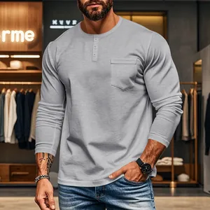 Close-up of slim-fit gray Henley t-shirt featuring three-button collar and chest pocket