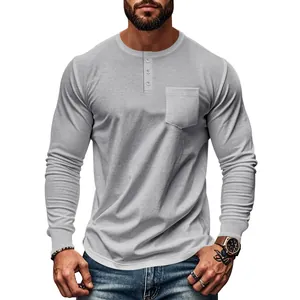 Close-up detail of men's slim fit gray long sleeve Henley shirt with chest pocket