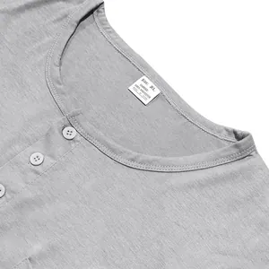 Close-up detail of the grey men's long sleeve T-shirt neckline with button and size tag