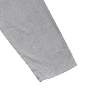 Close-up of the sleeve cuff on a grey men's long-sleeve t-shirt with fine stitching