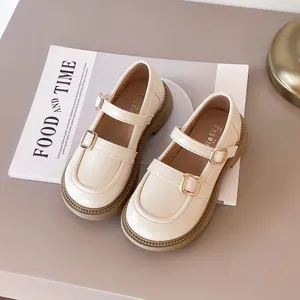 Classic beige British style Mary Jane leather shoes for girls with double gold buckles.