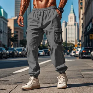 Detailed view of grey men's cotton linen cargo pants featuring drawstring and pockets