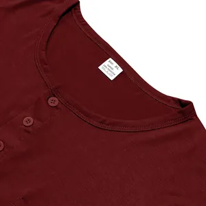 Detailed view of burgundy men's henley t-shirt collar with buttons and white size tag