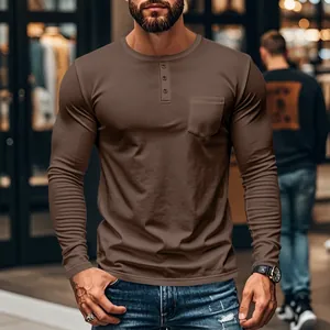 Close-up of men's slim fit long sleeve Henley shirt in brown with pocket