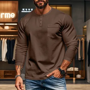 Detailed shot of men's slim fit brown long-sleeve Henley T-shirt with functional chest pocket