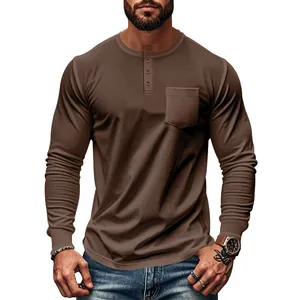 Detailed view of men's slim fit brown long sleeve Henley shirt with chest pocket detail