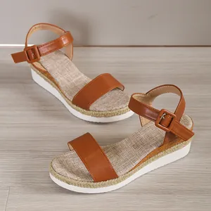 Brown platform wedge sandals with ankle strap and white thick sole for summer wear