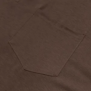 Close-up of the chest pocket and fabric texture on a brown men's long sleeve T-shirt.