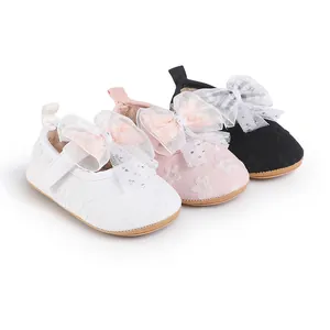 Soft sole baby walker shoes with large lace bow and floral embroidery for infant girls