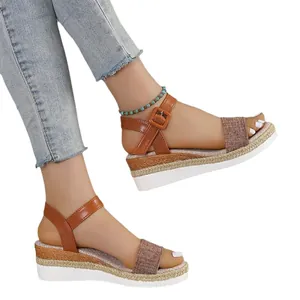 Comfortable women's platform wedge sandals with brown ankle strap and fabric toe band.
