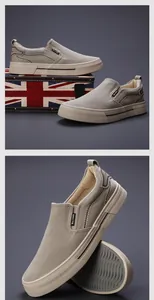 Detailed view of khaki men's casual canvas slip-on loafers with durable rubber soles.